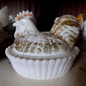 Antique milk glass little rooster on nest.